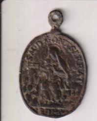 S. M. De Montserrat. Exergo. Roma. medalla (AE 30 mms.) R/ Cáliz entre Ángeles. Siglo XVIII