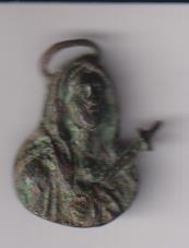 Dolorosa. Figura troquelada y gran relieve (AE 30 mms) Probable adorno de Mueble. Siglo XVIII