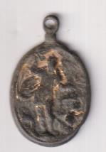 Virgen con Niño Jesús. Medalla (AE 26 mms.) R/ Arcangel SAn Miguel. Siglo XVII