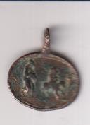 Nacimiento de Jesús. Medalla (AE 15x20 mms.) R/ Huida a Egipto. Siglo XVIII