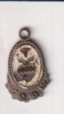 Corazón atravesado por espada. Medalla (AE 15 Mms.) R/ Recuerdo Virgen de la Santa Misión