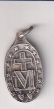 Inmaculada. Medalla (AL 22 mms.) R/ Cruz sobre M, debajo corazón de Jesús y de maría