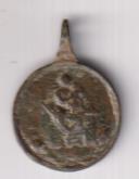 Ntra. Sra. del Laurent. Medalla (AE 17.) R/ Cruz con crucificado vestido y ángeles. Siglo XVII-XVIII