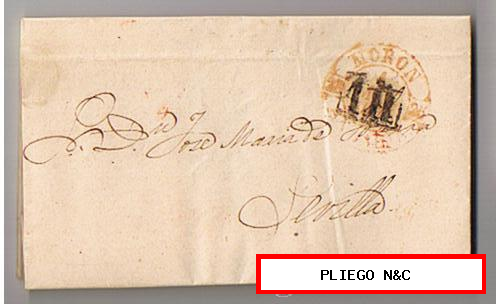 Carta de Morón a Sevilla. De 4 May. 1853. con fechador Baeza 2 R. y marca de porteo 1R. negro en centro del Baeza