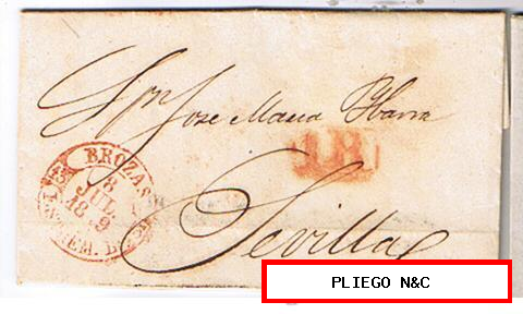 Carta de Brozas a Sevilla. De 8 Jul. 1849. Con fechador Baeza 5 R. y marca de porteo 1R rojo. Bonito