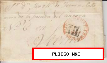 Carta de Cáceres a Sevilla del 14 Sep. 1853. Con Baeza 9 R. y porte 1R. negro al dorso