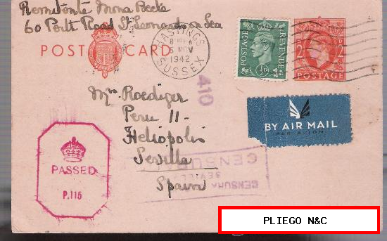 Tarjeta Entero postal de Gran Bretaña a Sevilla. De 5-Nov-1942, complementada con sello nº 209