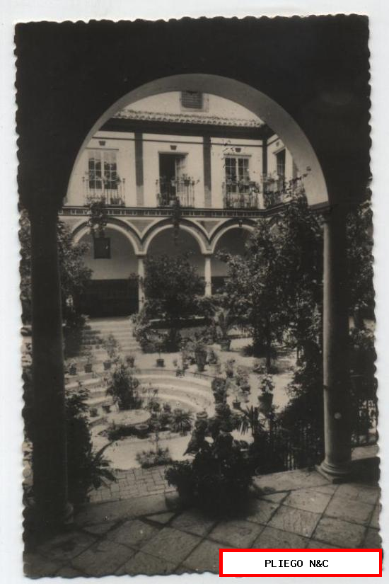 Sevilla. Patio de los Venerables. Franqueado y fechado en 1951