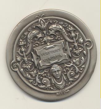 Espejo (5 cms) Publicidad de Perfumes Mirurgia en metal Blanco. RARO