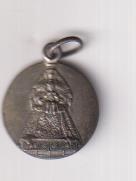 Virgen con Niño Jesús. Medalla (AR 17 mm.) 