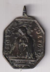 N. S. dela soledad. Exergo: Caritas. Medalla (AE 37 Mms.) R/ S. Franc de Paula. Siglo XVIII. RARA