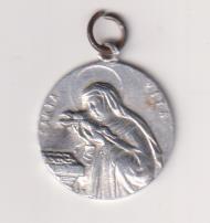 Santa Rita. Medalla (AL. 2,2 cms.)